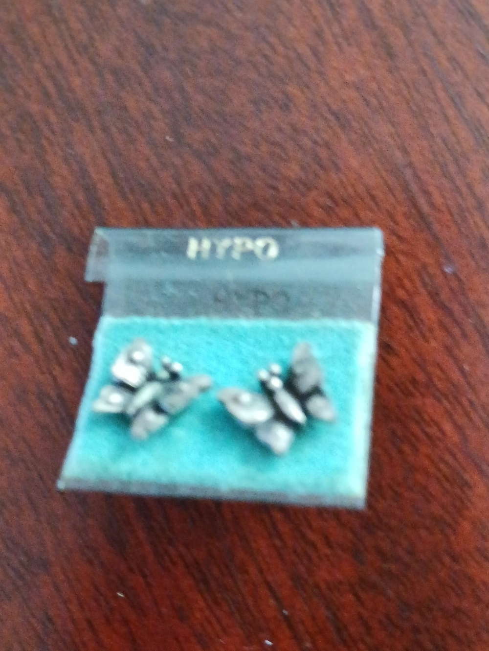 Hypo Silver Butterfly Stud Earrings — Teal Display